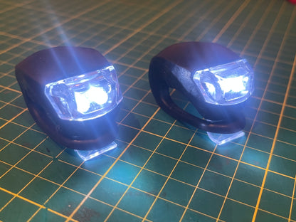 PAIR OF CRUTCHLIGHTS®  THE NEW LIGHTING SOLUTION FOR MOBILITY AIDS..