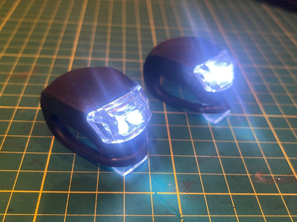 PAIR OF CRUTCHLIGHTS®  THE NEW LIGHTING SOLUTION FOR MOBILITY AIDS..